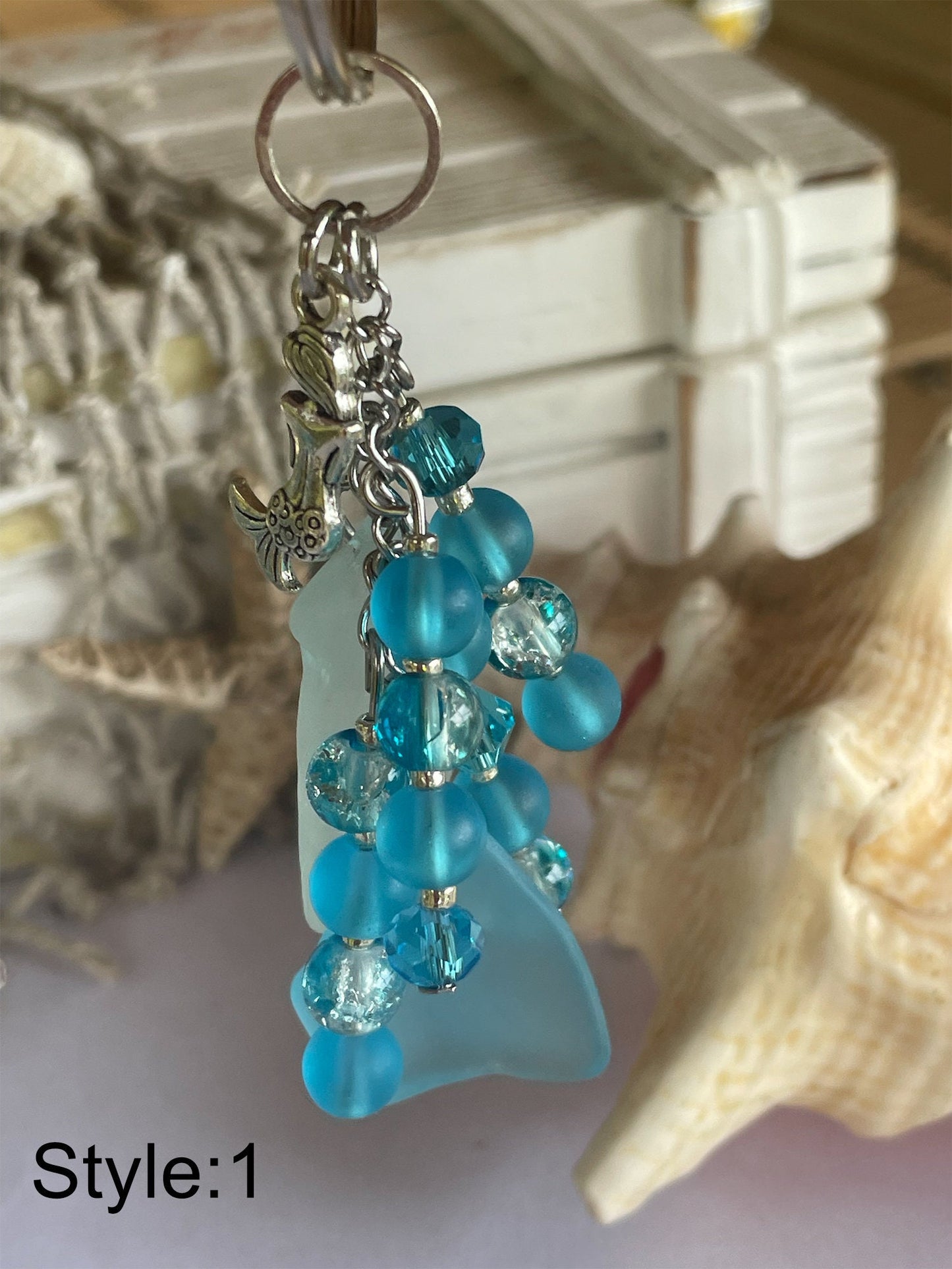 This cute Mermaid Beach Car keychain with seaglass and glass Beads is the perfect beaded keychain. Never loose your keys again!