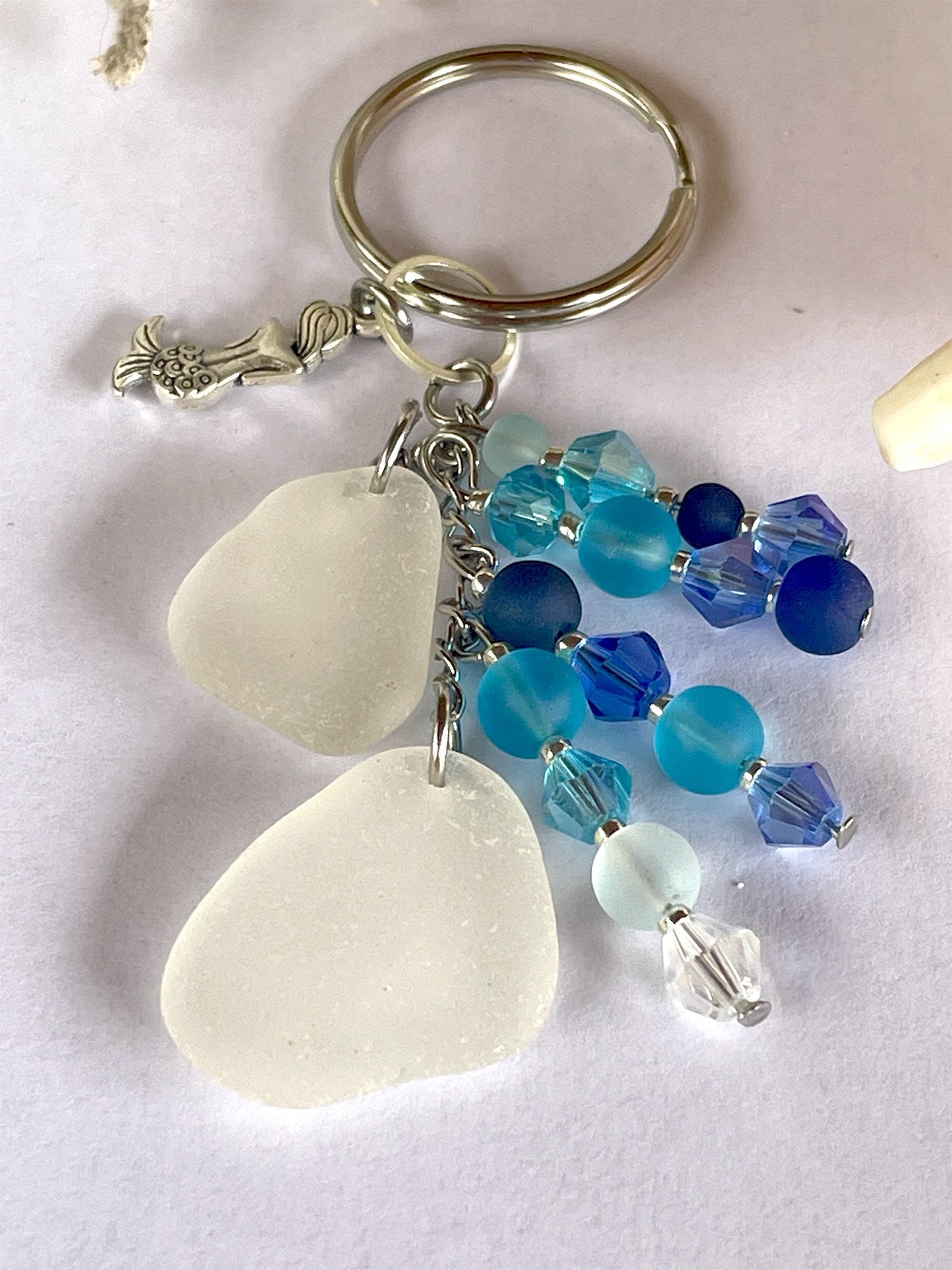 This cute Mermaid Beach Car keychain with seaglass and glass Beads is the perfect beaded keychain. Never loose your keys again!
