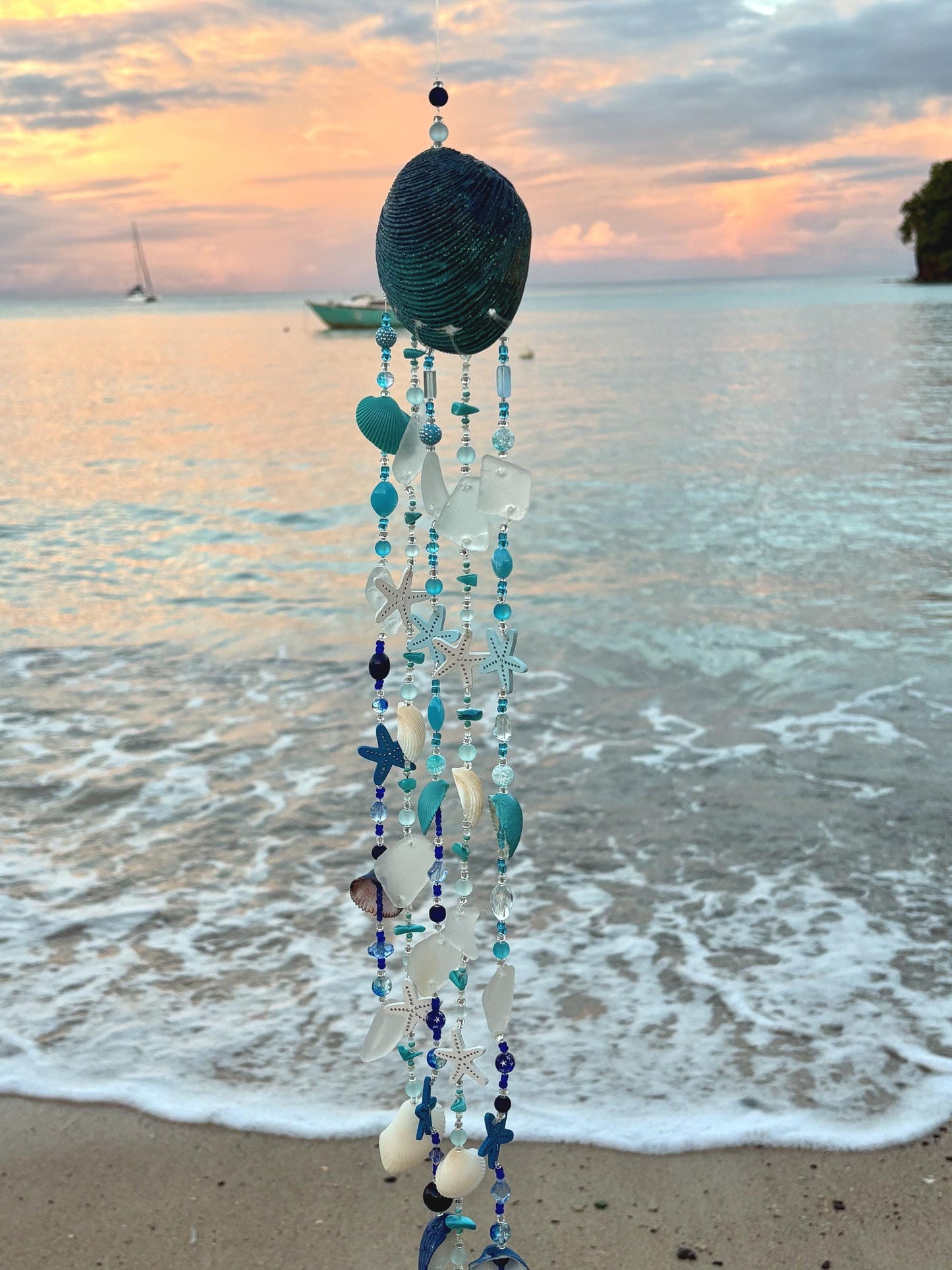 Clam Shell Wind Chime with genuine sea glass, shells, and wooden starfish. Unique Gift for all Beach Lovers