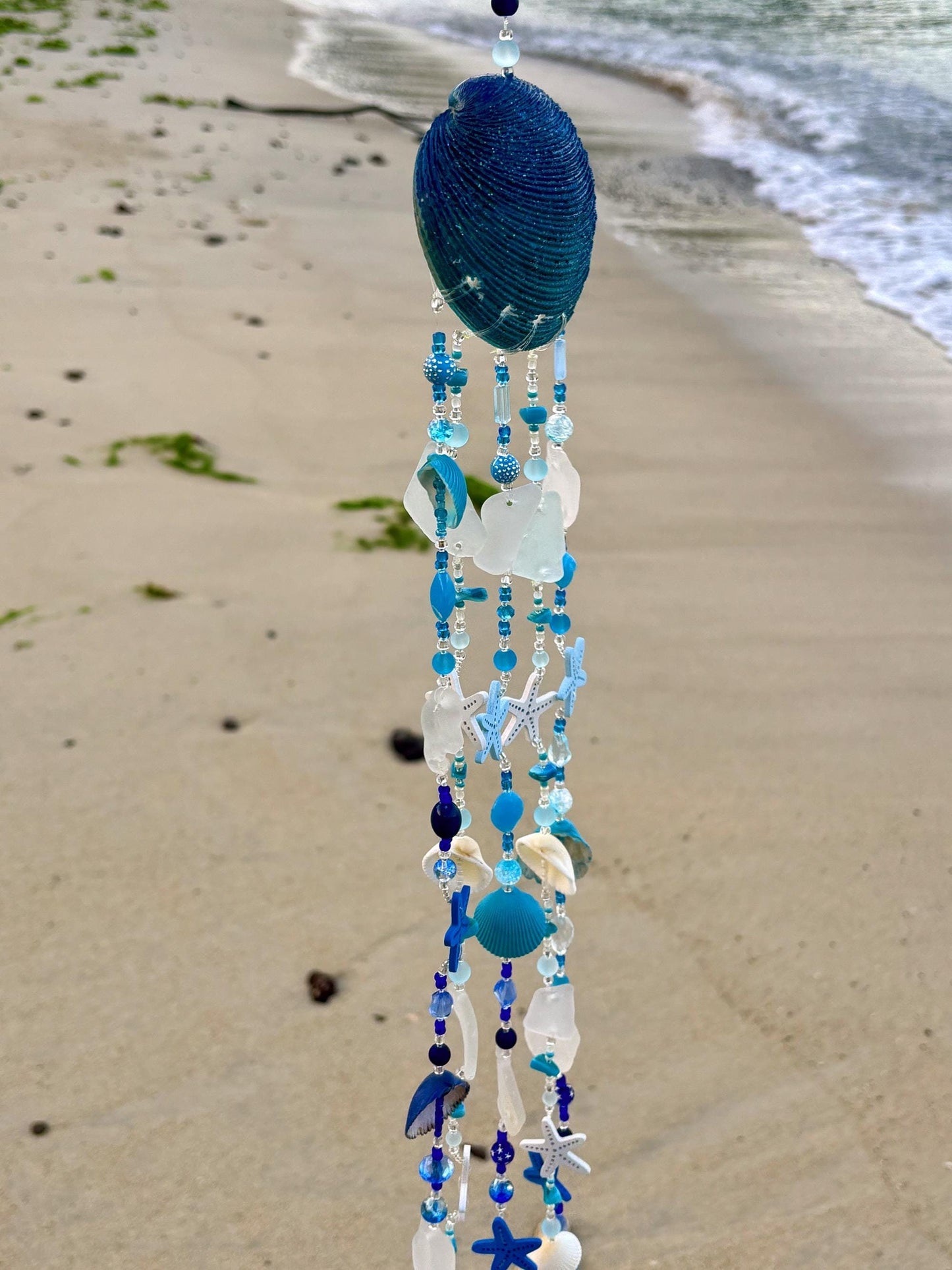 Clam Shell Wind Chime with genuine sea glass, shells, and wooden starfish. Unique Gift for all Beach Lovers