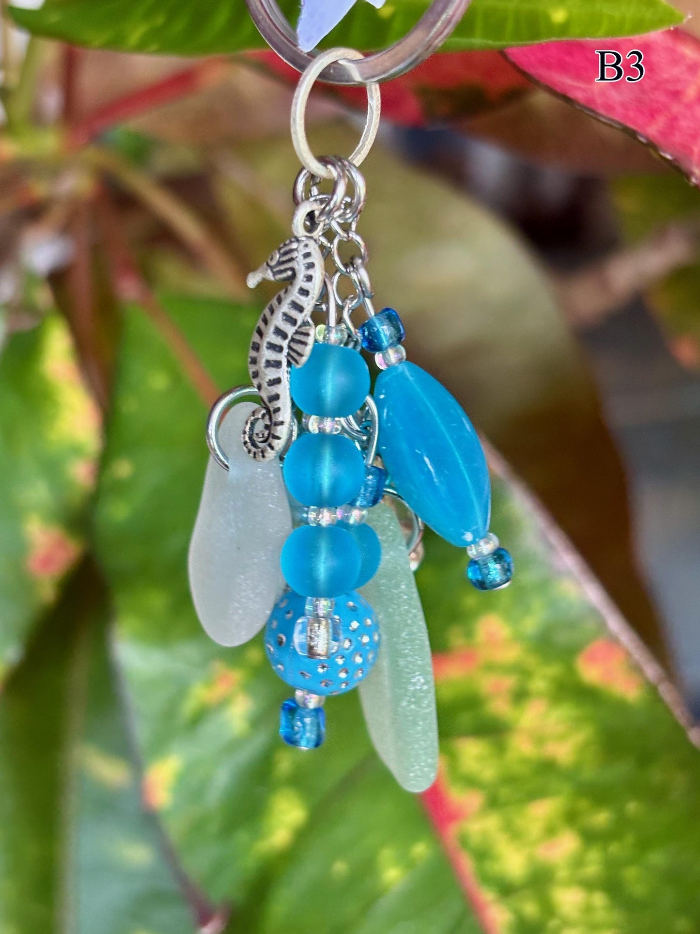 This cute Beach Car keychain with seaglass and glass Beads is the perfect beaded keychain. Never loose your keys again!