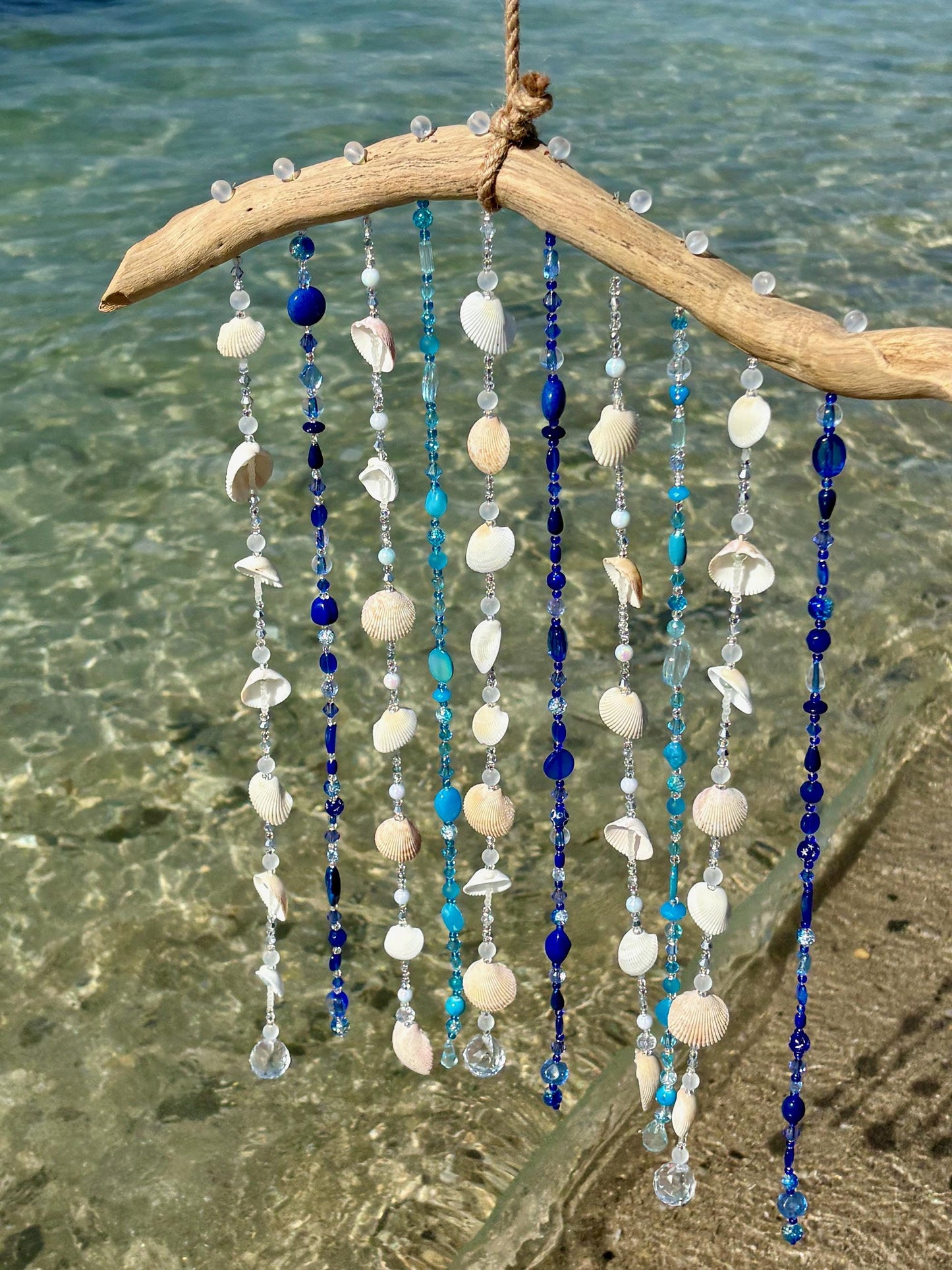 Tropical wind chime and sun catcher with sea shells, glass beads, and crystals on Driftwood. Gift for Beach Lovers