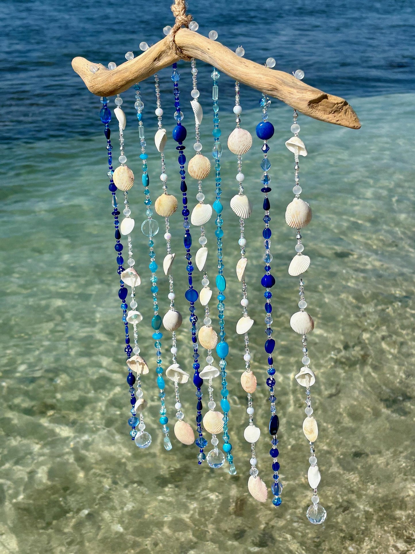 Tropical wind chime and sun catcher with sea shells, glass beads, and crystals on Driftwood. Gift for Beach Lovers