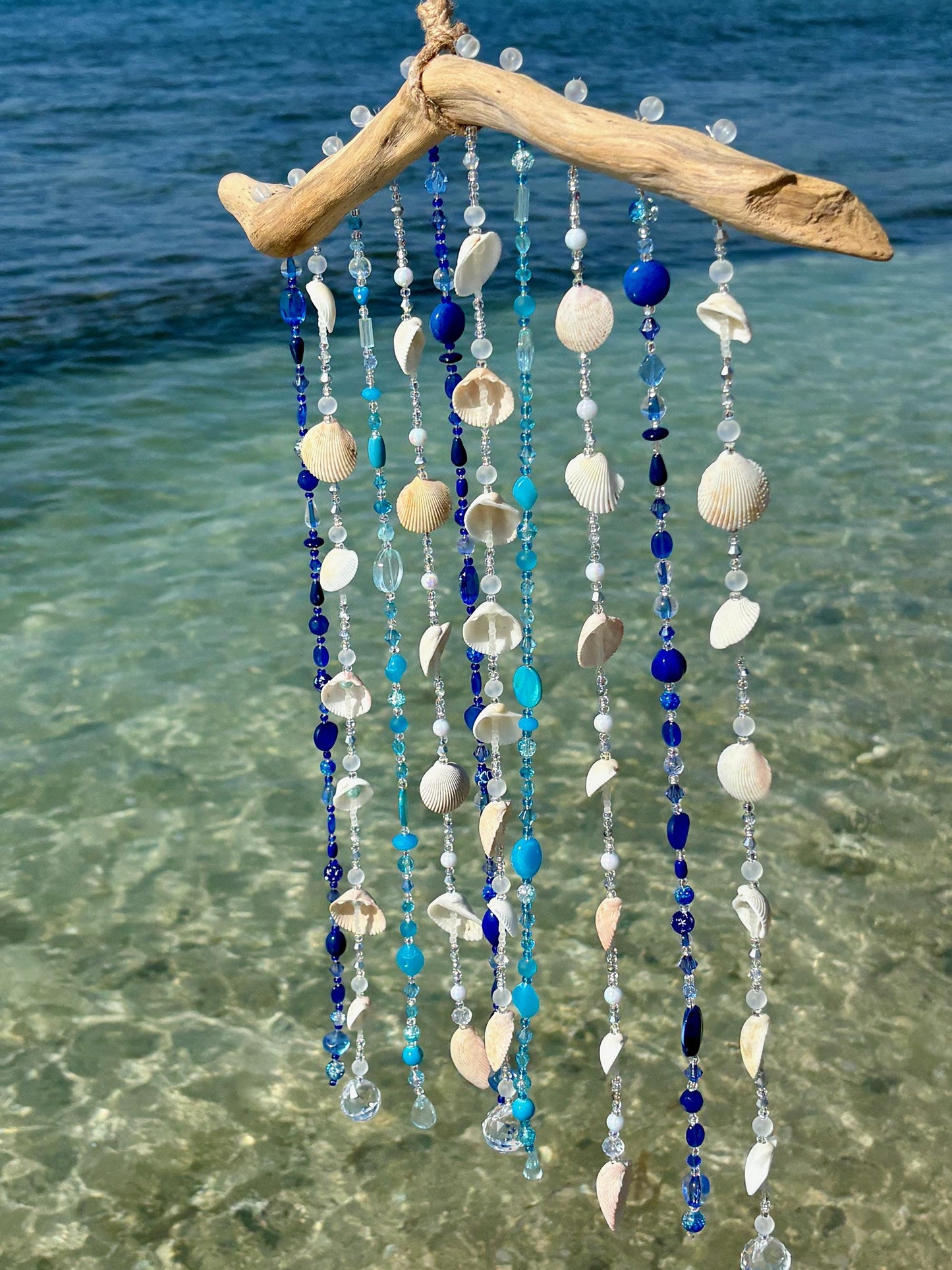 Tropical wind chime and sun catcher with sea shells, glass beads, and crystals on Driftwood. Gift for Beach Lovers