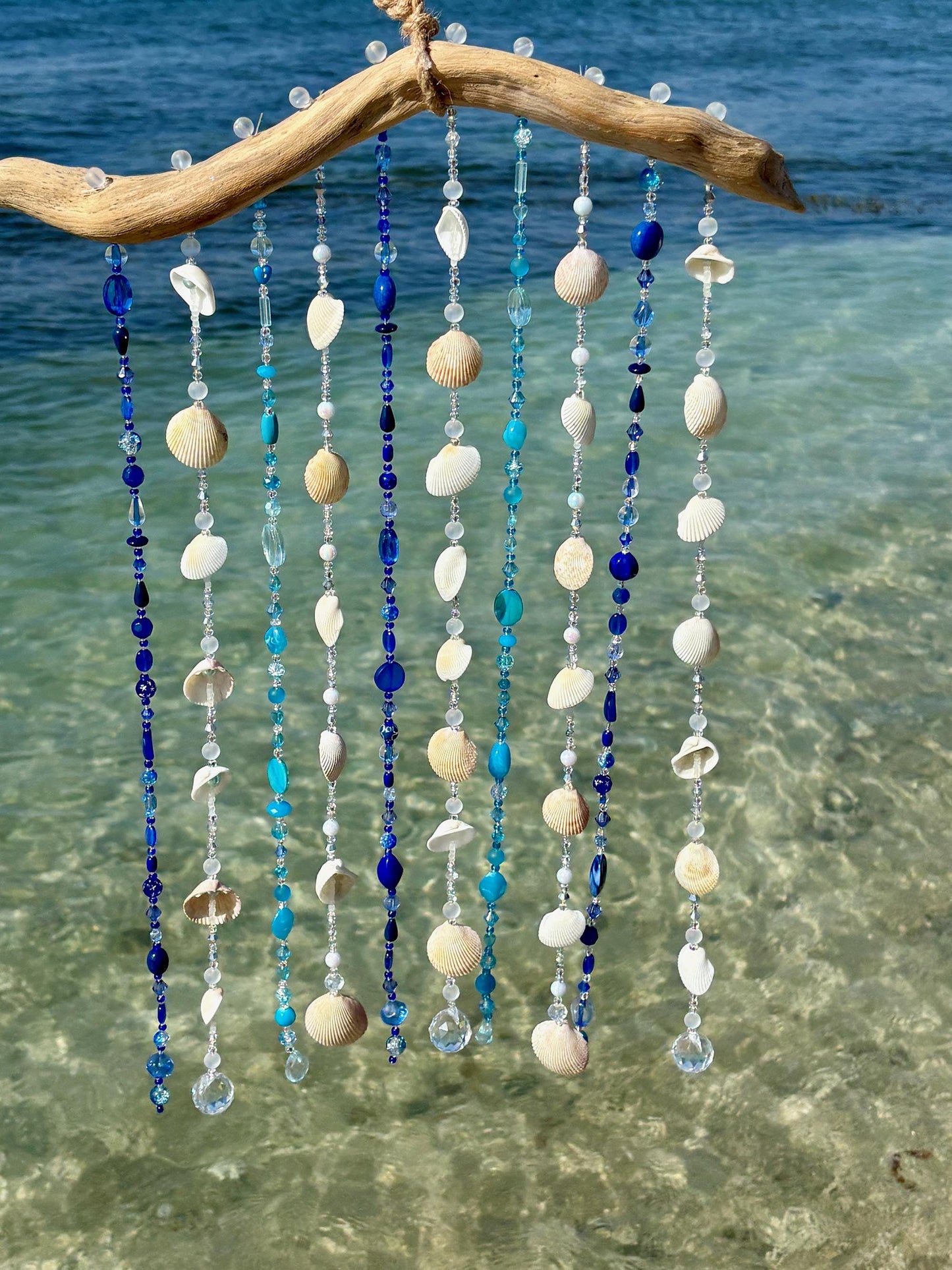 Tropical wind chime and sun catcher with sea shells, glass beads, and crystals on Driftwood. Gift for Beach Lovers