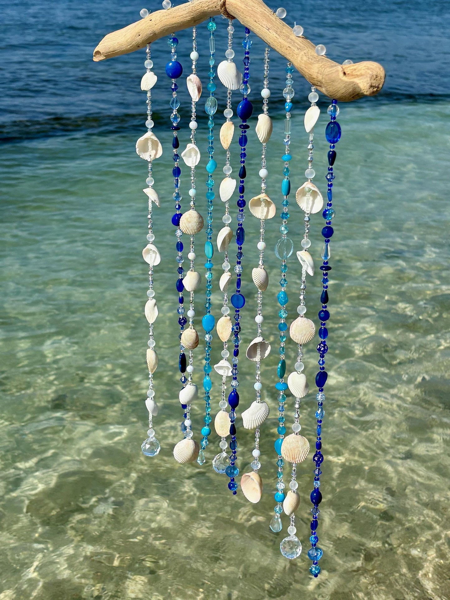 Tropical wind chime and sun catcher with sea shells, glass beads, and crystals on Driftwood. Gift for Beach Lovers