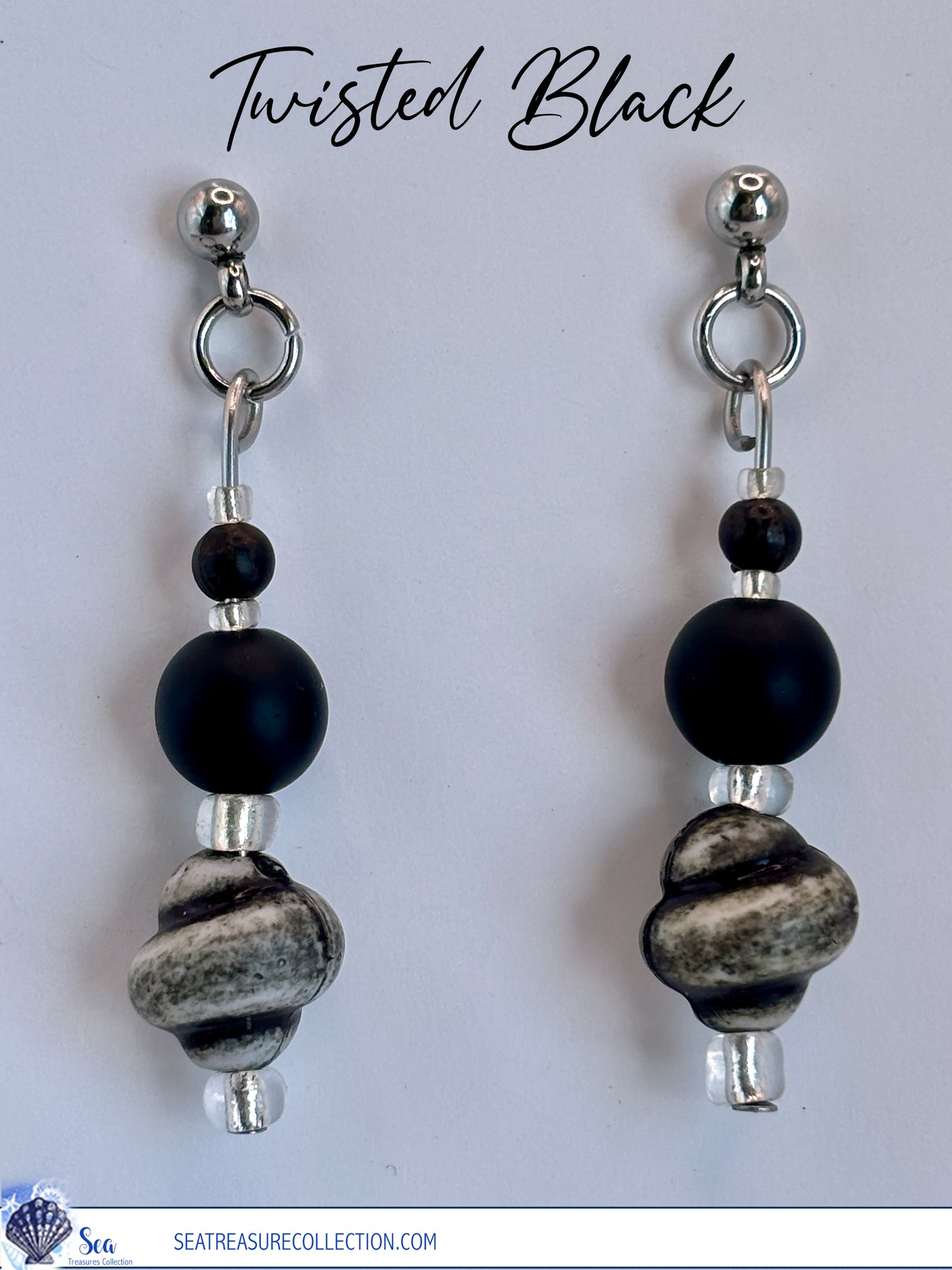 Pair of earrings with black and gray beads on a white background