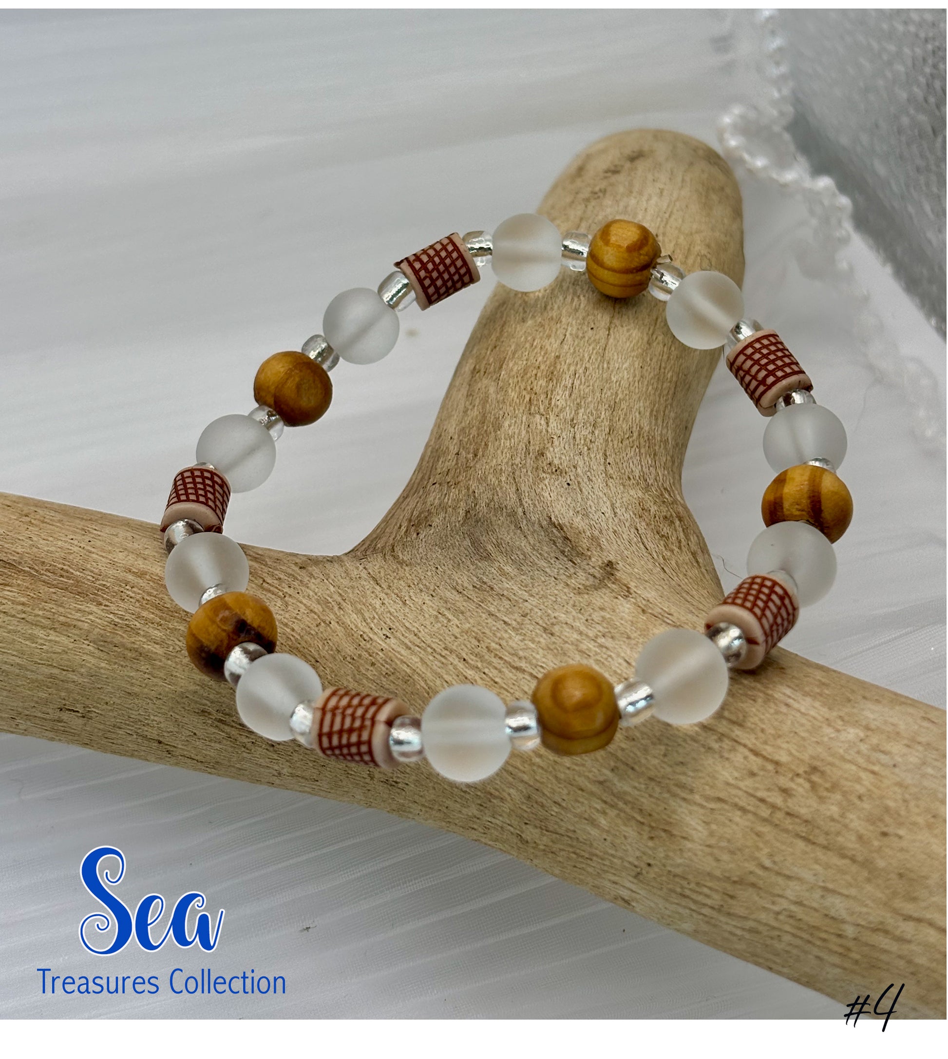 Beaded bracelet with natural wood piece, 'Sea Treasures Collection' branding.