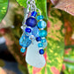This cute Mermaid Beach Car keychain with seaglass and glass Beads is the perfect beaded keychain. Never loose your keys again!
