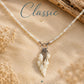 Handmade Whispering Shell Necklace Classic style with white seed beads, natural shells and stainless steel accents.