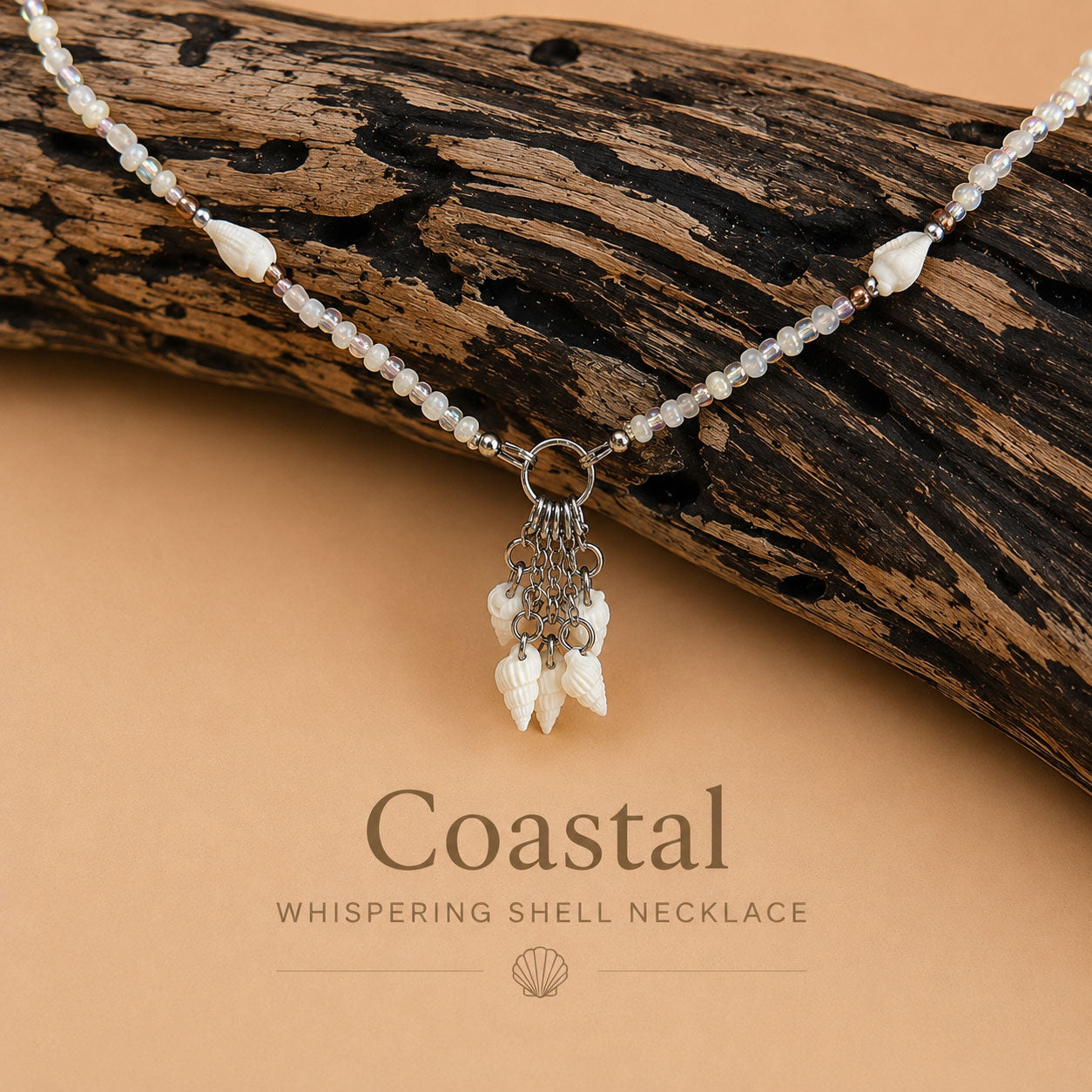Handmade Whispering Shell Necklace Coastal style featuring shell beads, glass accents and cascading shell pendant.