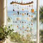 Seashell Serenity Driftwood Wind Chime displayed in a sunny coastal window overlooking the Caribbean.