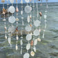 Video of white tropical beach windchime