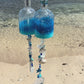 Video of our rum bottle wind chimes