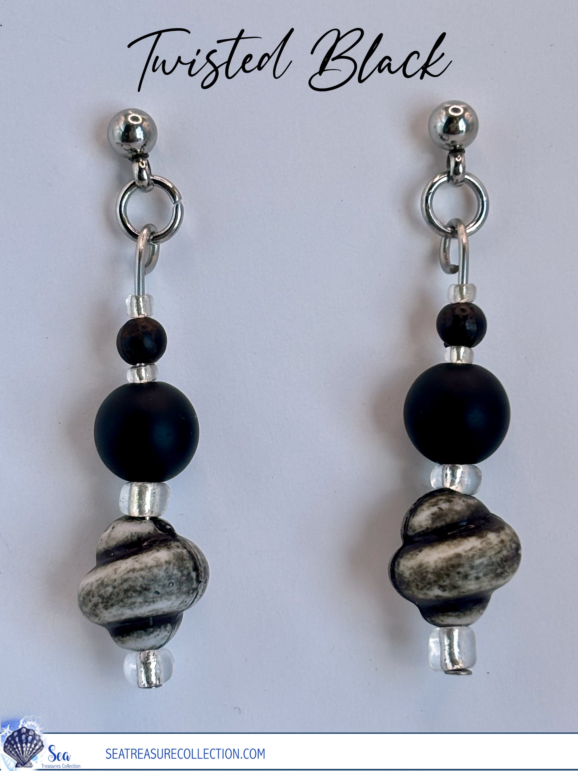 Pair of earrings with black and gray beads on a white background