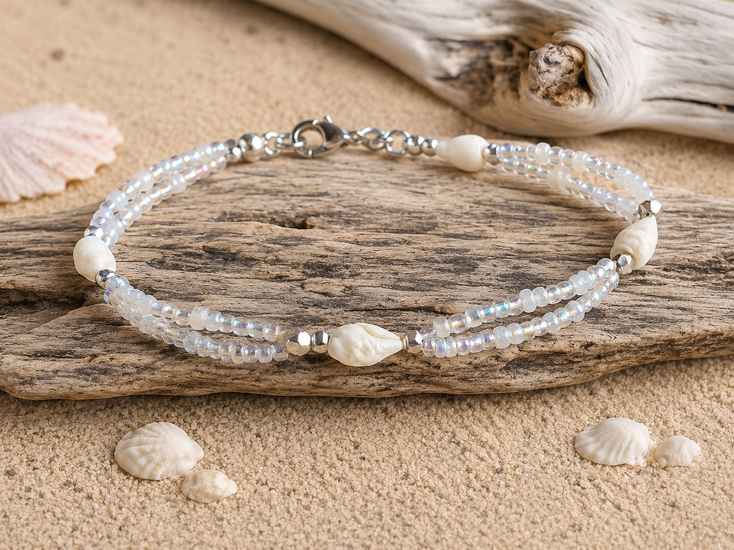 Handmade Whispering Shell Bracelet featuring natural shells, seed beads and stainless steel findings